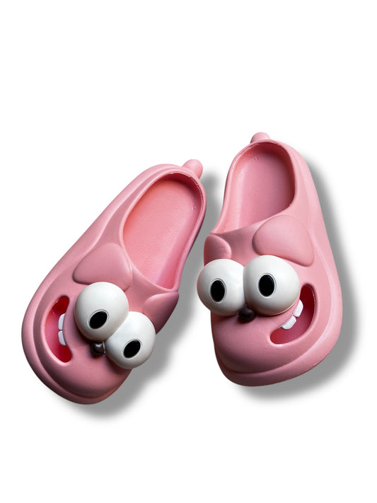 Big eyed dog slides